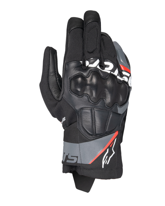 Alpinestars Corozal V3 Drystar® Gloves, Adventure Motorcycle Gloves, Black with Deep Gray and Red Fluo accents, top-down view featuring leather-covered SP knuckle protection, textile and leather chassis, and short cuff design, waterproof adventure riding gear