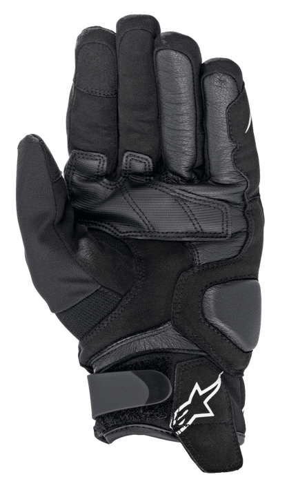 Alpinestars Smx-1 Drystar® Gloves, Waterproof Motorcycle Gloves, Black, palm view showing reinforced leather and synthetic suede construction, padded landing zones for durability, and a wrist closure with the white Alpinestars logo.
