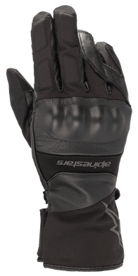 Alpinestars Range 2 In One GORE-TEX Glove With Goregrip Tech, Black motorcycle glove, back of hand view featuring a molded knuckle protector, leather and fabric construction, long cuff with Alpinestars branding, waterproof adventure touring gear