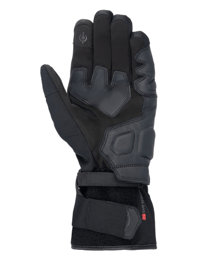 Alpinestars Tourer W-7 V2 Drystar® Gloves, Black motorcycle gloves, palm view featuring leather reinforcements, padded grip areas, touchscreen-compatible fingertip, and secure wrist strap closure.