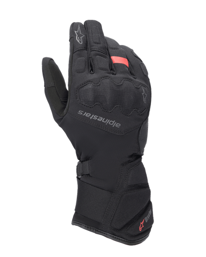 Alpinestars Tourer W-7 V2 Drystar Gloves, Winter Motorcycle Touring Gloves, Black with red accents, featuring reinforced knuckle protection, Alpinestars logo on the back of the hand, and a long adjustable cuff with Drystar branding