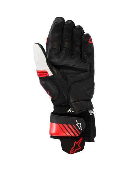 Alpinestars GP Plus R V3 Leather Gloves, Racing/Sport Motorcycle Gloves, Black White and Bright Red, palm view showing reinforced leather construction, palm sliders, and an aramid stretch cuff, featuring a secure wrist strap with Alpinestars logo and ergonomic pre-curved design