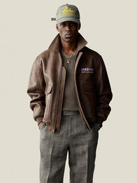 Aime Leon Dore World’s Borough Leather Flight Jacket Jacket unisex detail view 3 | Dash Racegear — Brown World’s Borough 2026 leather jacket with zip closure and subtle logo patch for rugged fan appeal.