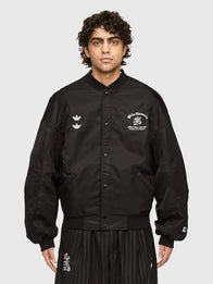 Adidas x Willy Chavarria Coaches Jacket Jacket unisex detail view 3 | Dash Racegear — Adidas x Willy Chavarria 2026 coaches jacket in black satin with embroidered stripes and sleek zipped front.