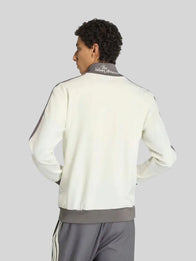 Adidas x Mercedes F1 Team AMG Jacket Jacket unisex detail view 2 | Dash Racegear — Off white Adidas Mercedes F1 AMG Silver Arrows track jacket with zip front and team logos.