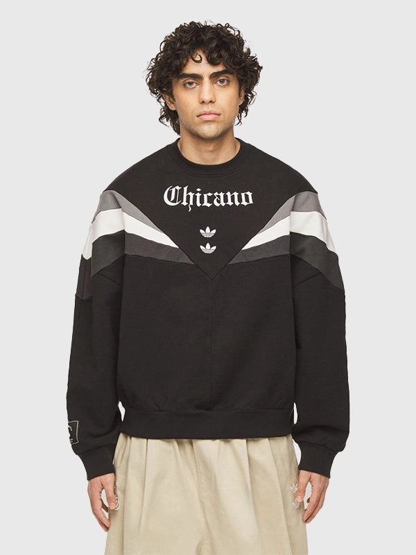 Adidas x Willy Chavarria Chicano Crewneck 2.0 Sweatshirt Sweatshirt unisex detail view 3 | Dash Racegear — Unisex Adidas Chicano 2.0 crewneck sweatshirt in black with bold puff-print eagle and heritage-inspired front design.