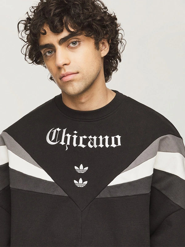 Adidas x Willy Chavarria Chicano Crewneck 2.0 Sweatshirt Sweatshirt unisex detail view 4 | Dash Racegear — Adidas x Willy Chavarria Chicano 2.0 crewneck in black featuring bold front graphics and a unisex relaxed silhouette.