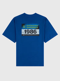 ALD x New Balance Running Bib T-Shirt Shirt unisex detail view 2 | Dash Racegear — Unisex blue Running Bib T-shirt inspired by New Balance x Aimé Leon Dore with a clean contemporary look.