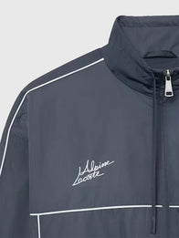 Lacoste x Alpine Track Jacket Jacket unisex detail view 4 | Dash Racegear — The 2026 Lacoste x Alpine Grey Jacket blends premium style, relaxed comfort, and a contemporary motorsport-inspired look.