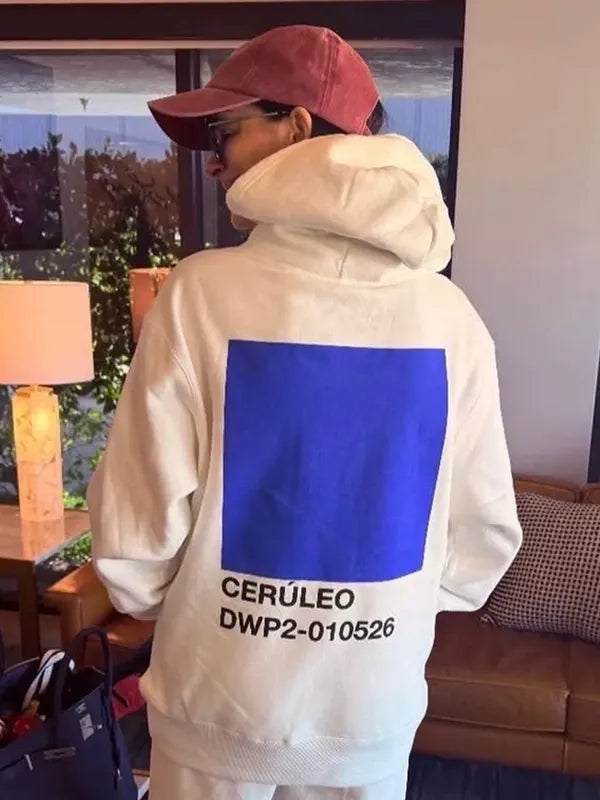 Anne Hathaway Cerulean Hoodie Hoodie unisex front product view | Dash Racegear — Devil Wears Prada 2 Anne Hathaway Cerulean Blue Pullover Hoodie in beige, cozy fan wear for casual movie-inspired style.