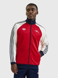 Arsenal adidas 25/26 Track Jacket Jacket unisex detail view 2 | Dash Racegear — adidas Arsenal 25/26 unisex red/white track jacket with relaxed fit and embroidered club badge on chest.