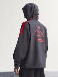 Adidas x Audi Revolut F1 Mechanics Rain Jacket Jacket unisex detail view 3 | Dash Racegear — Adidas x Audi Revolut F1 black mechanics rain jacket with hood, crafted for staying dry during wet race conditions.