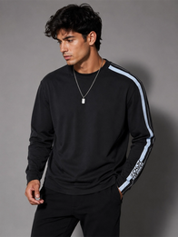 Jung Kook x Calvin Klein Racing Stripe T-Shirt Shirt unisex detail view 6 | Dash Racegear — BTS Jung Kook Calvin Klein black shirt with track-style stripes, crew neckline, and full arm length sleeves