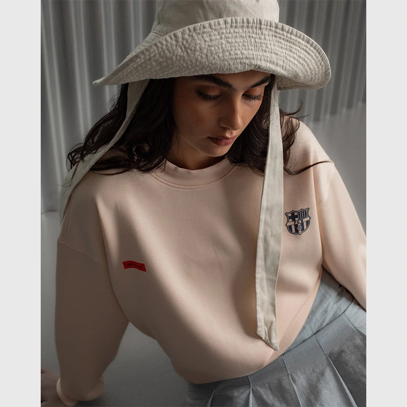 Barça Crew Essentials Sweatshirt Sweatshirt unisex front product view | Dash Racegear — Front view of Barca Essentials peach crewneck fleece sweatshirt.