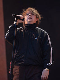 Lewis Capaldi Adidas Track Jacket Jacket unisex front product view | Dash Racegear — Unisex Lewis Capaldi 2026 Performance Adidas Firebird Full-Zip Track Jacket in black with a sleek athletic silhouette.