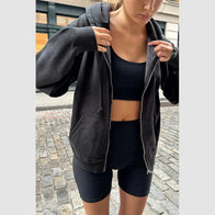 Brandy Melville Christy Hoodie Hoodie unisex front product view | Dash Racegear — The Brandy Melville Christy Hoodie is cozy, relaxed, and perfect for casual days.