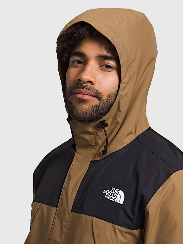 The North Face Men’s Antora Jacket Jacket unisex detail view 8 | Dash Racegear — The North Face Men’s Antora Jacket blends bold brown and black colors with lightweight, weather-resistant fabric.