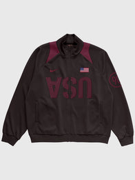 CJ x Nike USA Total 90 Anthem Jacket Jacket unisex front product view | Dash Racegear — Front image of CJ x Nike USA Total 90 Anthem Jacket Brown