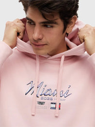 Tommy Hilfiger x Cadillac F1 Team Miami Hoodie Hoodie unisex detail view 4 | Dash Racegear — Unisex Tommy Hilfiger x Cadillac F1 Miami hoodie in pink, bold F1 racing inspired street fashion look.