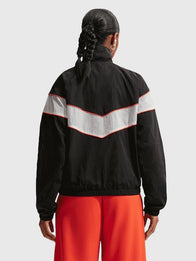 Chelsea Nike Woven Windrunner Jacket Jacket unisex detail view 2 | Dash Racegear — Women’s Chelsea F.C. Nike Windrunner Full-Zip Jacket, black, versatile for training, travel, or game-day wear.