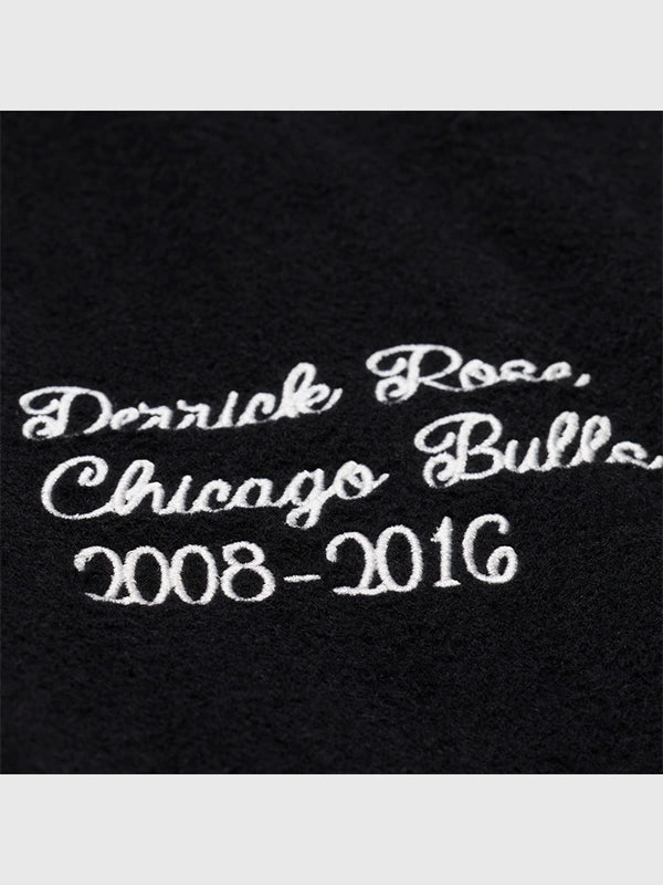 Derrick Rose Chicago Bulls Retirement Letterman Jacket Jacket unisex detail view 8 | Dash Racegear — Men & women can rock the Derrick Rose Chicago Bulls Black Retirement Letterman Jacket with bold patches and comfy fit.