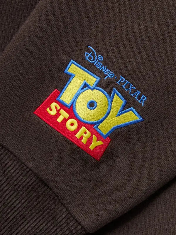Disney x Kith for Pixar Woody Nelson Hoodie Hoodie unisex detail view 4 | Dash Racegear — 2025 Disney x Kith for Pixar Woody Nelson Hoodie, brown, versatile hoodie for streetwear or fan events.