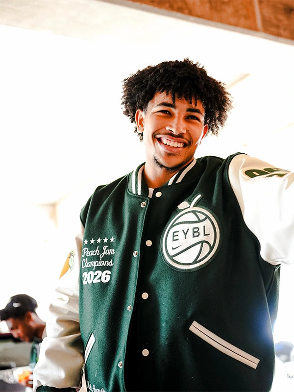 Florida Rebels Peach Jam Champions Varsity Jacket Varsity Jacket unisex front product view | Dash Racegear — Green and white Florida Rebels EYBL Peach Jam Champions 2026 varsity jacket crafted with leather sleeves and warm wool comfort.