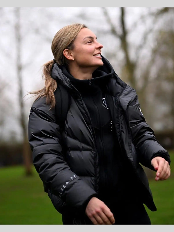 Chelsea FC UEFA Women’s Champions League Puffer Jacket Puffer Jacket unisex detail view 4 | Dash Racegear — Rock the stadium look with this Chelsea FC 2025 black hooded puffer, tailored for women enjoying outdoor games.
