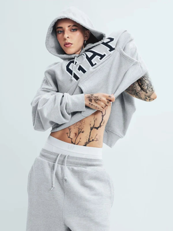 Gap x Young Miko Hoodie Hoodie unisex front product view | Dash Racegear — Gap x Young Miko 2026 grey fleece pullover hoodie with cozy fabric, perfect for casual streetwear.
