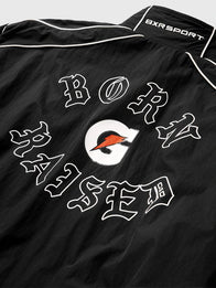 Born x Raised x Gatorade Track Jacket Jacket unisex detail view 3 | Dash Racegear — Unisex full-zip jacket featuring Born x Raised x Gatorade branding with a modern athletic-inspired design.