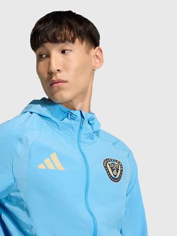 Philadelphia Union Tiro Tech Full Zip Windbreaker Jacket Jacket unisex detail view 4 | Dash Racegear — Tiro Tech Philadelphia Union 2026 windbreaker in blue with hood and zip front, perfect for casual game day wear.