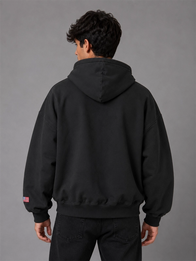 Gap x Katseye Lara Hoodie Hoodie unisex detail view 6 | Dash Racegear — Black Gap x Katseye hoodie carrying Lara edition marks, loose torso cut, ribbed cuffs, and fleece backing