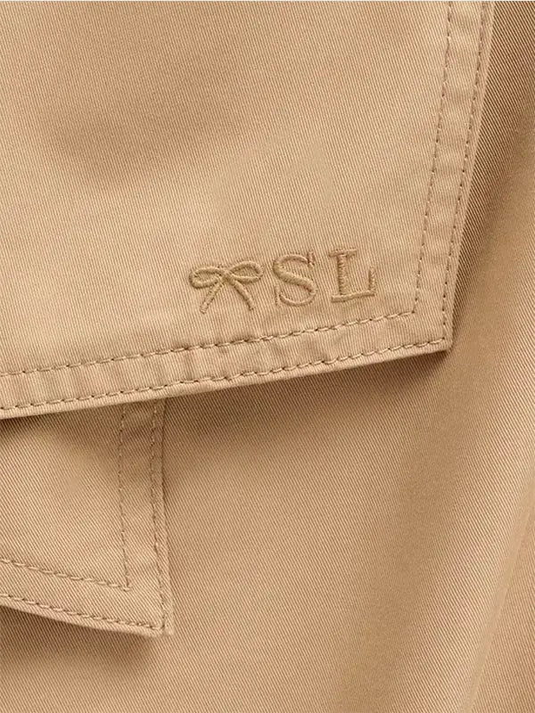 Gap × Sandy Liang Bow-Back Trench Coat Coat unisex detail view 5 | Dash Racegear — Sandy Liang collaboration trench coat with oversized bow at the back
