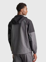 North Face Trishull Jacket Jacket unisex detail view 4 | Dash Racegear — Lightweight grey hooded jacket for men featuring The North Face design and smooth casual finish.