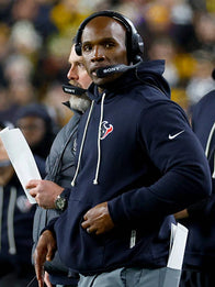 Houston Texans DeMeco Ryans 2025 Sideline Hoodie Hoodie unisex front product view | Dash Racegear — DeMeco Ryans Houston Texans 2025 Nike Sideline Pullover Hoodie, navy and comfortable, perfect for cool-weather game days.