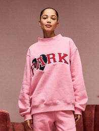 Parke Jean Heart Varsity Mockneck Sweatshirt Sweatshirt unisex detail view 3 | Dash Racegear — Pink Recreation Parke Women’s Valentine’s 2026 Jean Heart Varsity Mockneck Fleece Sweatshirt with heart detail and comfy fit.