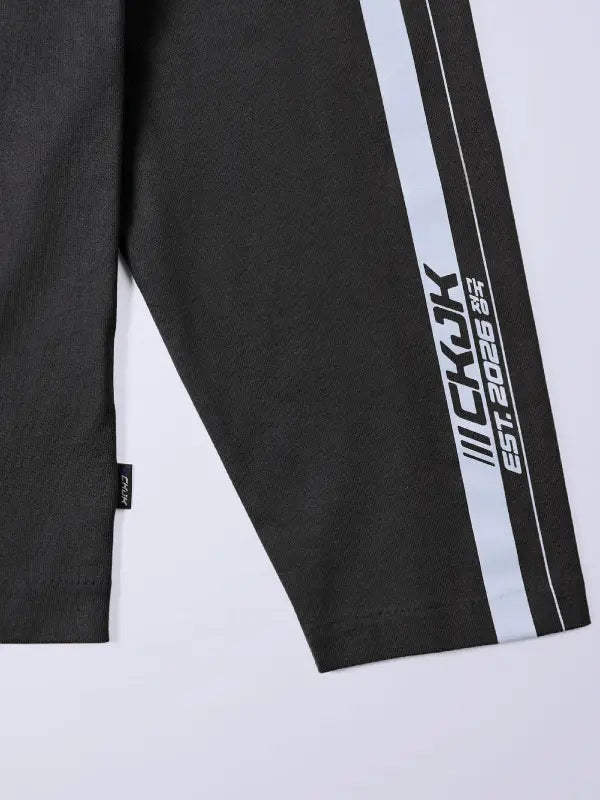 Jung Kook x Calvin Klein Racing Stripe T-Shirt Shirt unisex detail view 3 | Dash Racegear — Jungkook inspired Calvin Klein black tee with racing stripe design and relaxed casual wear appeal.