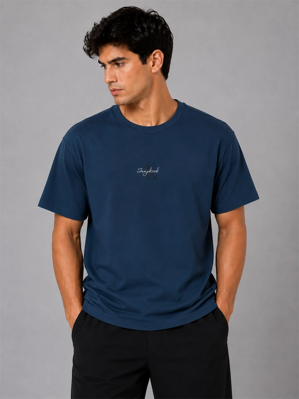Jungkook x Calvin Klein Monogram T-shirt Shirt unisex detail view 6 | Dash Racegear — Calvin Klein x Jungkook blue T-Shirt carrying all-over monogram artwork with a rounded neckline and easy drape