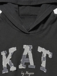 Gap x Katseye Megan Hoodie Hoodie unisex detail view 2 | Dash Racegear — Gap x Katseye Megan black hoodie 2026, soft pullover oversized style for modern casual looks.