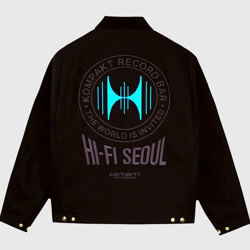 Carhartt WIP Kompakt Record Bar Jacket Jacket unisex detail view 2 | Dash Racegear — Back of a black Carhartt WIP x Kompakt Record Bar jacket with "HI-FI SEOUL" and a circular graphic