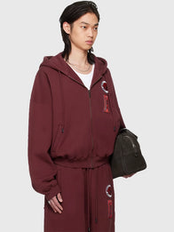 BRUCE LEE x LUU DAN Zip Hoodie Hoodie unisex detail view 2 | Dash Racegear — Burgundy full zip hoodie inspired by Bruce Lee x LUU DAN 2026 featuring smooth fabric and modern street style.