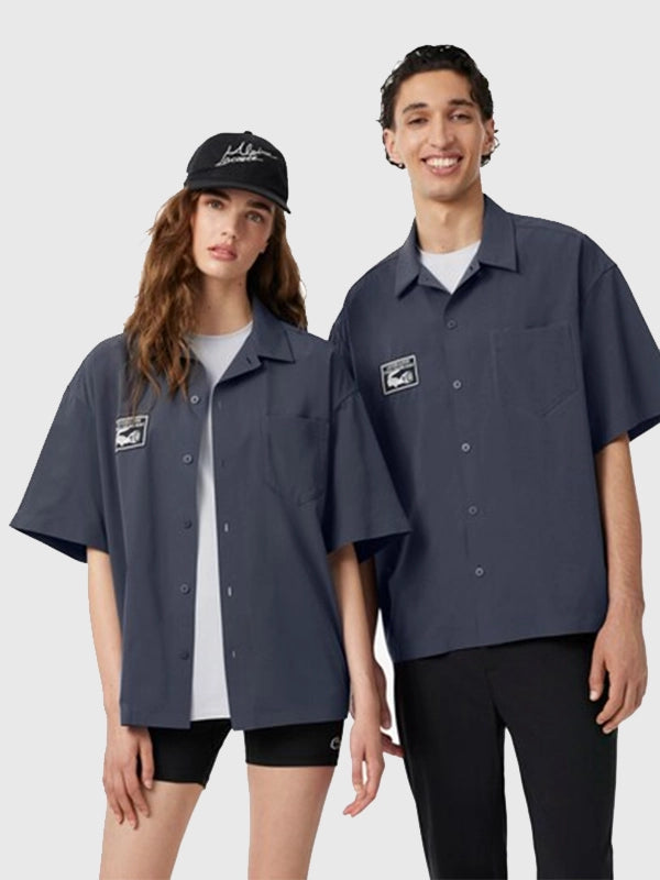 Lacoste x Alpine Poplin Shirt Shirt unisex front product view | Dash Racegear — Lacoste x Alpine 2026 Relaxed Fit Poplin Button Up Shirt in Dark Grey featuring a soft feel and refined casual style.