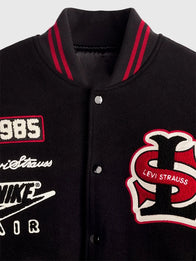 Levi’s x Jordan 2026 Varsity Jacket Varsity Jacket unisex detail view 3 | Dash Racegear — Black Levi’s x Jordan varsity jacket 2026, wool construction with leather sleeves for timeless sport-meets-street fashion.
