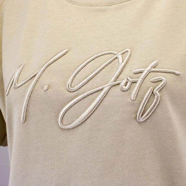 Maximilian Götz Ladies T - Shirt Signature sand