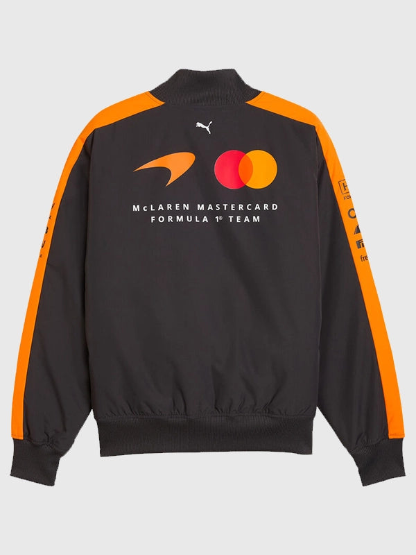 McLaren F1 PUMA 2026 Team Bomber Jacket Bomber Jacket unisex detail view 2 | Dash Racegear — McLaren F1 PUMA 2026 black and orange bomber with bold logo accents, ideal for trackside or casual wear.