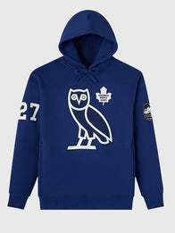 OVO Darryl Sittler Toronto Maple Leafs Hoodie Hoodie unisex front product view | Dash Racegear — Blue OVO 2026 Darryl Sittler Toronto Maple Leafs pullover hoodie, relaxed fit for streetwear looks or fan gear essentials.