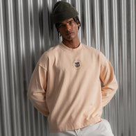 Barça Essentials Graphic Crew Sweatshirt Sweatshirt unisex front product view | Dash Racegear — Front shot of Barça Essentials 2025 graphic peach fleece sweatshirt.