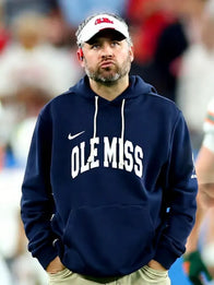 Pete Golding Ole Miss Hoodie Hoodie unisex front product view | Dash Racegear — Pete Golding Ole Miss Nike Hoodie offers relaxed fit, fleece comfort, and standout navy design for fans.