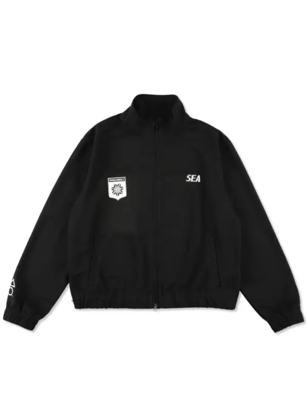 Playstation x WDS Track Jacket Jacket unisex front product view | Dash Racegear — PlayStation x Wind and Sea black track jacket blends sporty style with street-ready comfort for gamers and fans.