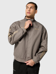 Porsche Legacy x PUMA Pepita Lifestyle Jacket Jacket unisex detail view 7 | Dash Racegear — Black White Taupe Unisex Jacket showcasing the 2026 PUMA x Porsche Legacy Pepita Lifestyle with sporty refinement